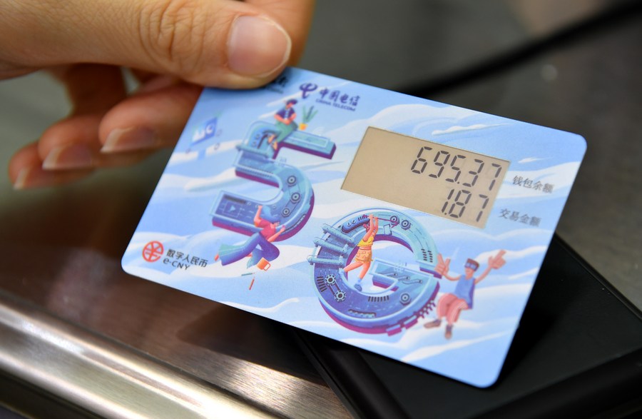 China testa yuan digital em mais cidades