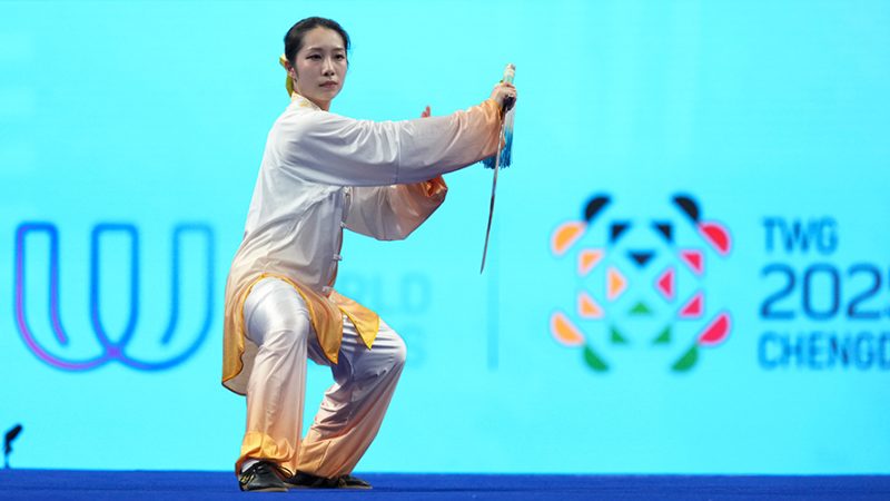 Medalhista chinesa de ouro nos Jogos Mundiais espera que Wushu entre nas Olimpíadas